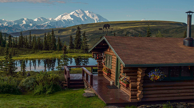 At its most reflective, Nugget Pond turns Camp Denali’s legendary views into an even greater spectacle. But you may spot more than peaks and pines on the surface: The (very) occasional moose has been known to swim here. | Photo courtesy Camp Denali