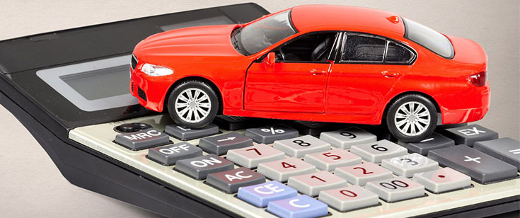 Red car on calculator Red car on calculator
