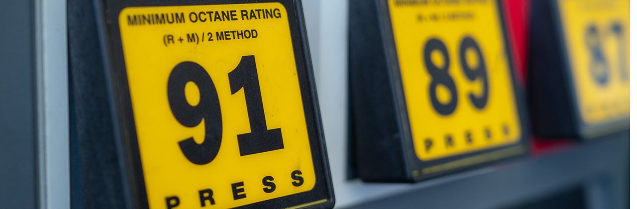 Close-up photo of the button for premium-grade fuel at a gas station pump