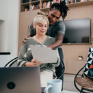 Couple sitting in living room