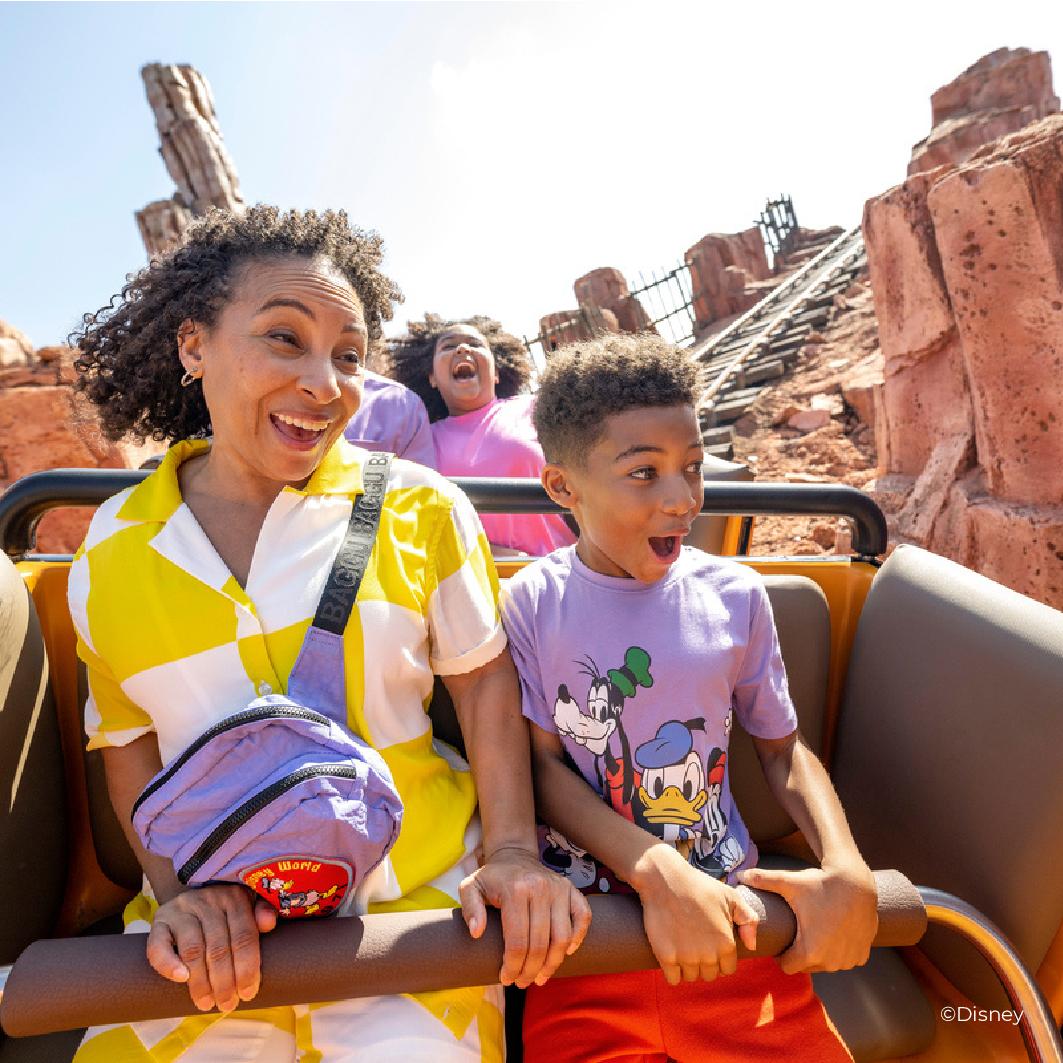 MOther and son ride a coaster