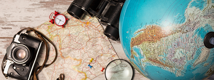 522636052-map-globe-camera-travel-planning Map globe camera travel planning