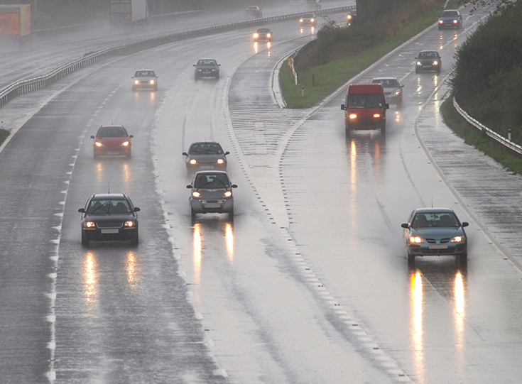 171558223-cars-driving-in-rain Cars driving in rain