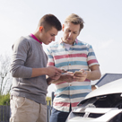 Two men exchanging insurance information