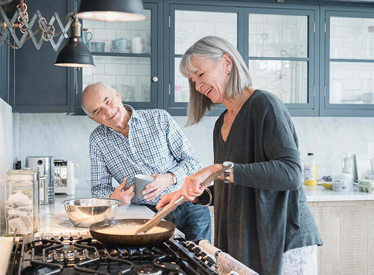 two_older_people_cooking Two older people cooking