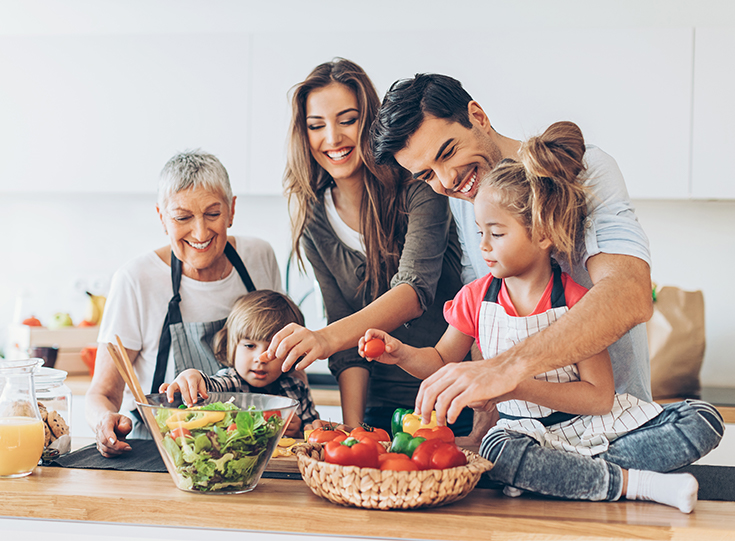 636653206-multigenerational-family-cooking Multigenerational family cooking