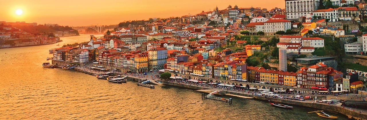 Sunset over the Douro River and the city center in Porto, Portugal