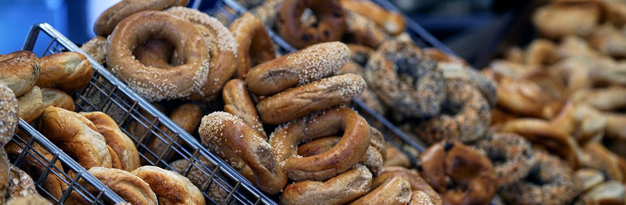 Baskets full of fresh bagels at a Montreal Canada bagel shop