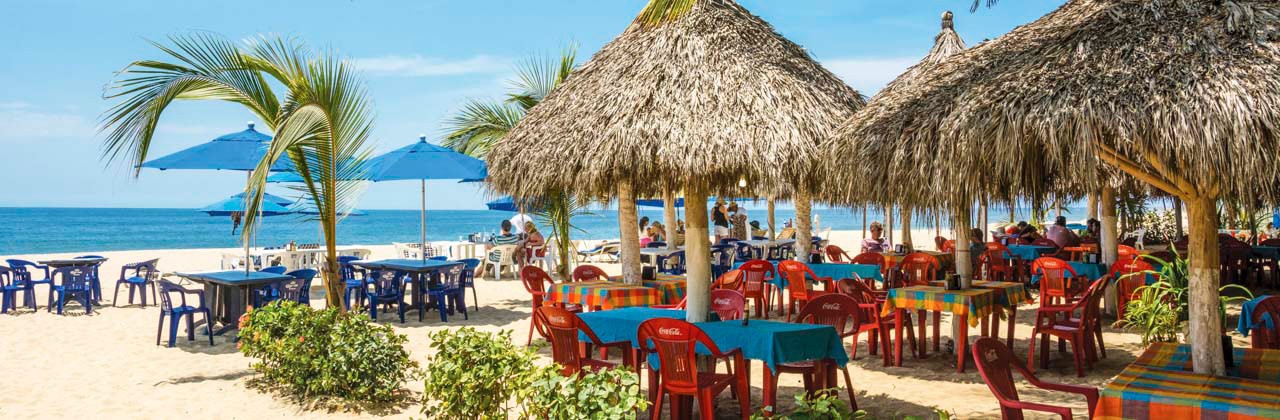 Dine on the beach in San Francisco, Mexico. Photo by Greg Vaughn/Alamy Stock Photo