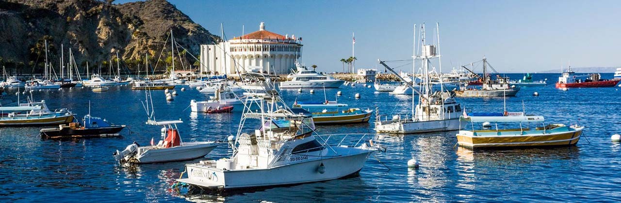 Avalon's casino is seen in the distance from Avalon Harbor