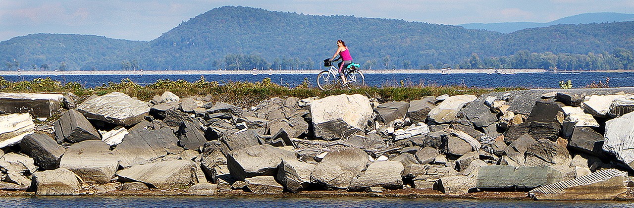 The 3-mile section of the Island Line Rail Trail that crosses Lake Champlain is a favorite among cyclists and walkers traveling between the greater Burlington area and South Hero Island. | Photo courtesy Lake Champlain Land Trust