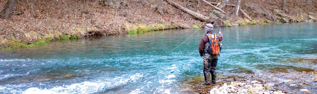 An angler fly-fishing for trout at Roaring River State Park. | Photo courtesy Missouri Department of Natural Resources