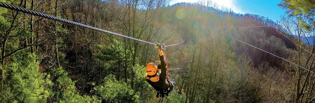 Taking a zip-line ride at Highlands Aerial Park. | Photo courtesy Highlands Aerial Park