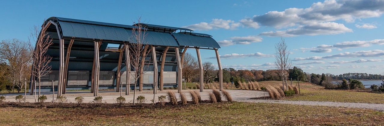 The park’s open-air steel-and-wood interpretive pavillion was inspired by traditional Native American buildings. 