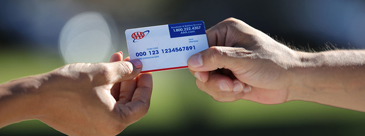 Handing aaa membership card Handing aaa membership card