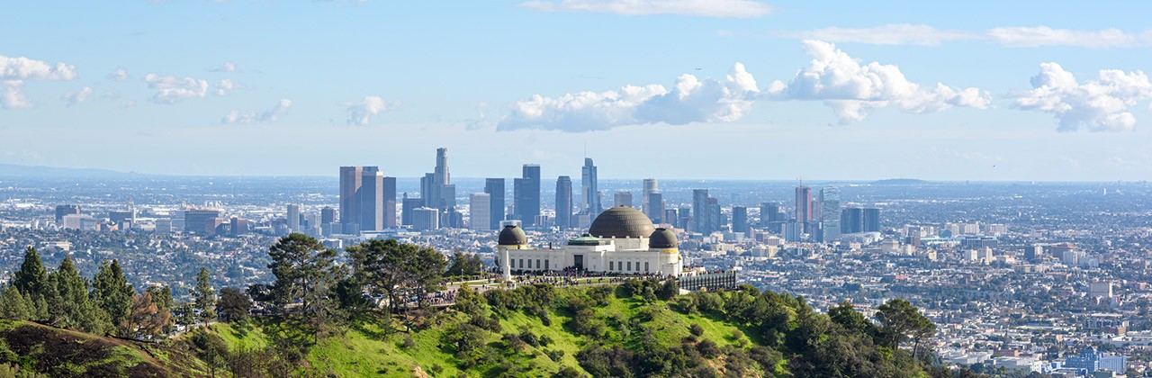 A view of the Griffith Observatory and downtown Los Angeles from Griffith Park.