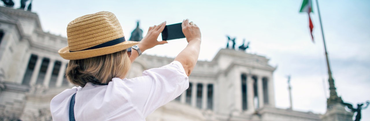 Woman taking photo with smartphone