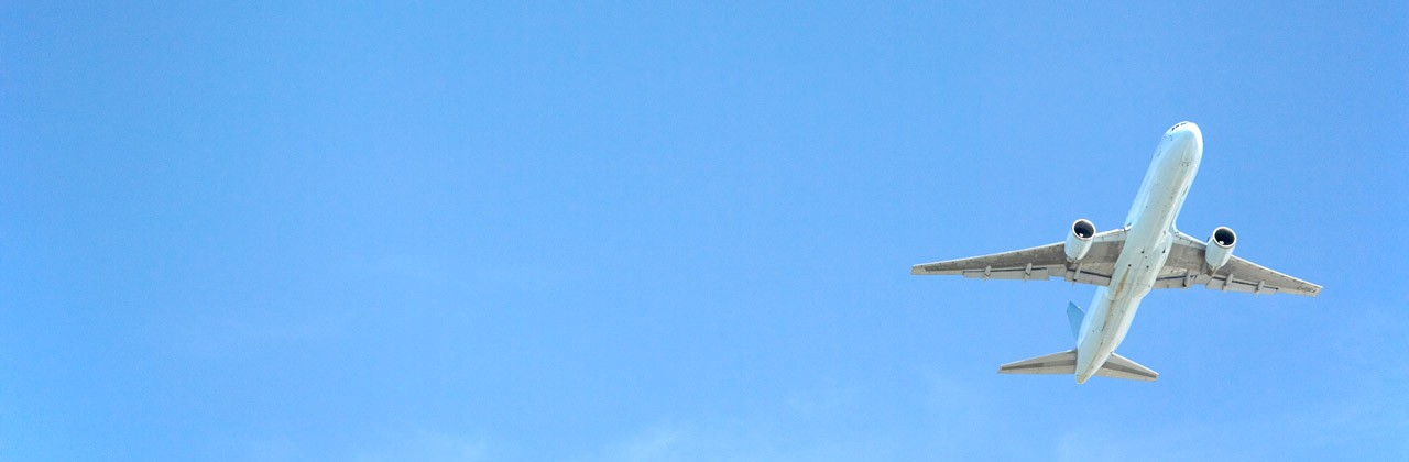 85926261-airplane-flying-blue-sky