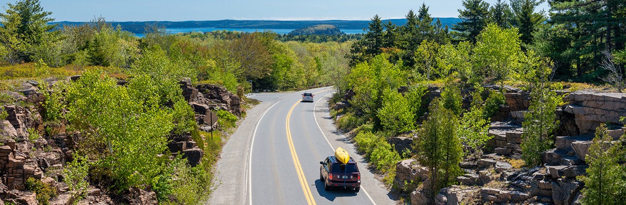 Cars driving through Acadia National Park