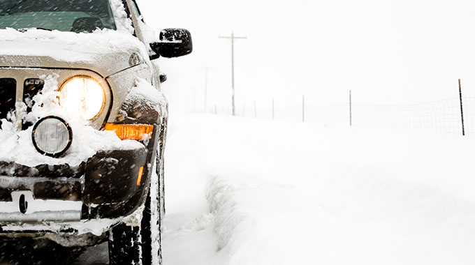 SUV driving in snow