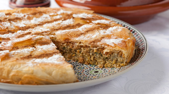 A sliced pastilla, showing the stuffing