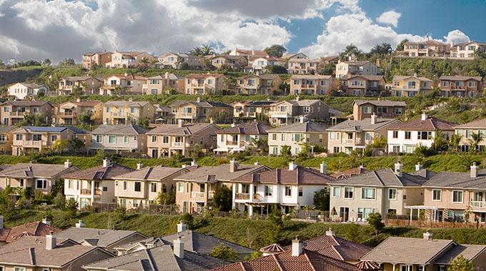 An aerial view of tract housing in the suburbs of Orange County