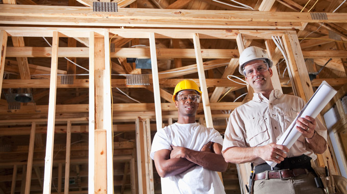 Contractors inside a structure in progress