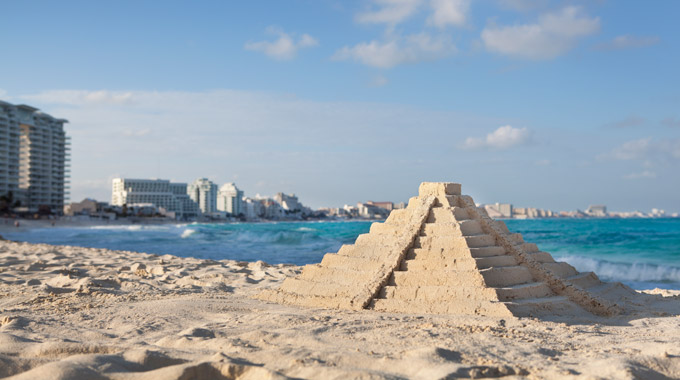 Sand pyramid on the beach in Cancun, Mexico
