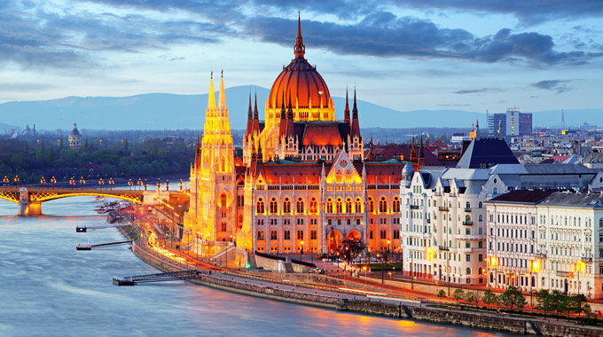 The Hungarian Parliament on the shore of the Danube in Budapest at dusk
