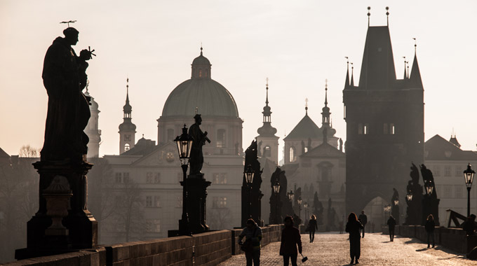 Pedestrians stroll on Charles Bridge