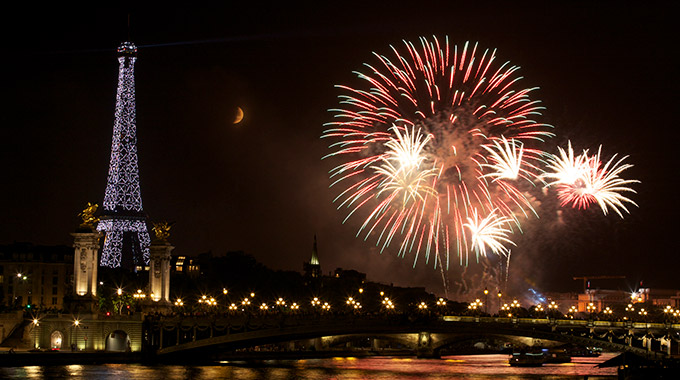 Fireworks at the Eiffel Tower for Bastille Day celebrations in Paris, France