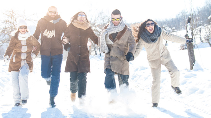 Group of people playing in the snow