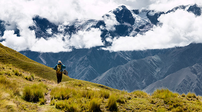 A hiker traverses in the Inca Trail high in the Andes
