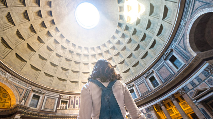 Woman inside the Pantheon in Rome