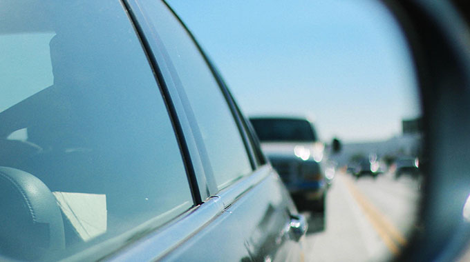 The view from a car's side mirror