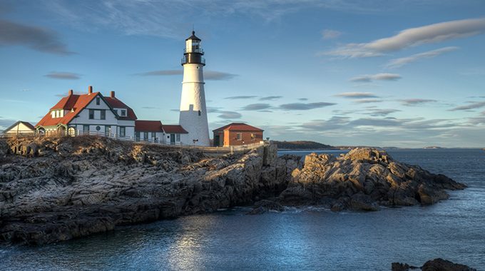 Exterior of the Portland Head Light lighthouse at sunset