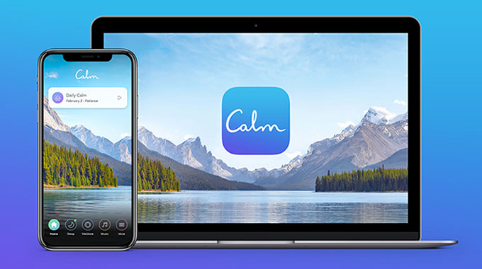 The Calm app shown on a smartphone and a laptop computer