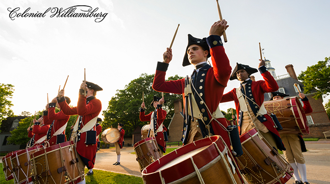 Historic re-enactors in colonial military dress at Colonial Williamsburg