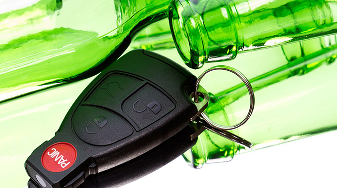 Car keys with beer bottles