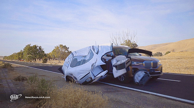 A test vehicle collides with the simulated disabled vehicle