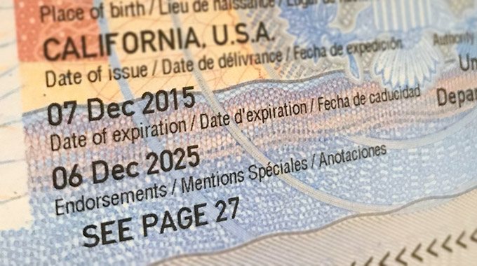 Closeup of an expiration date on a passport