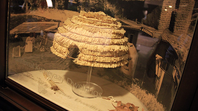 Exhibit about the Kumeyaay people, including a model home