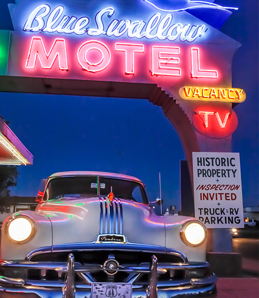 Nightime shot of the Blue Swallow Motel in Tucumcari, New Mexico.