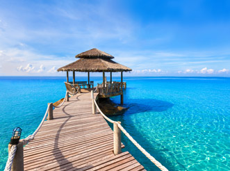 Bridge leading to gazebo over water