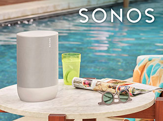 A Sonos home speaker on a table by the pool