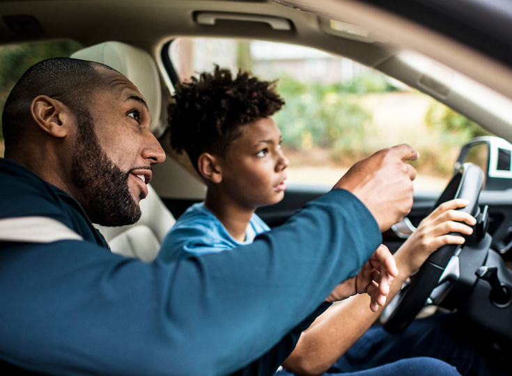 Father instructing son how to drive Father instructing son how to drive