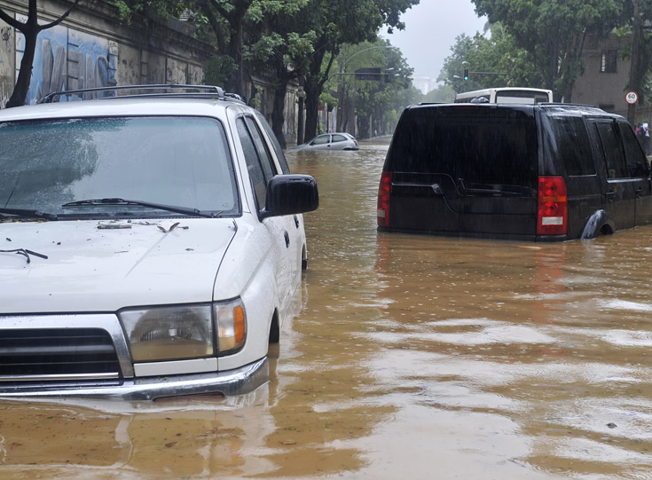 Cars sitting in floodwater Cars sitting in floodwater