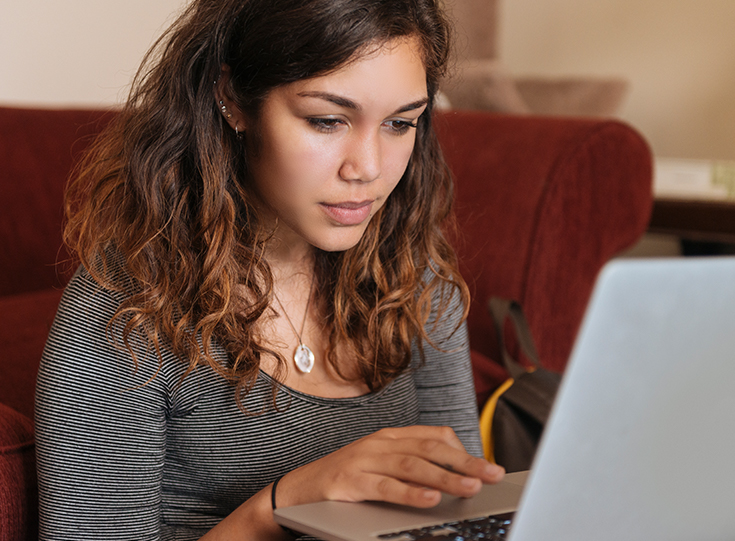Teen taking online driving course Teen taking online driving course