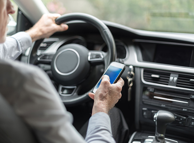 Distracted driver using cellphone Distracted driver using cellphone