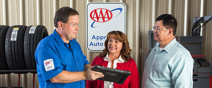 AAA Approved auto repair worker with clients AAA Approved auto repair worker with clients